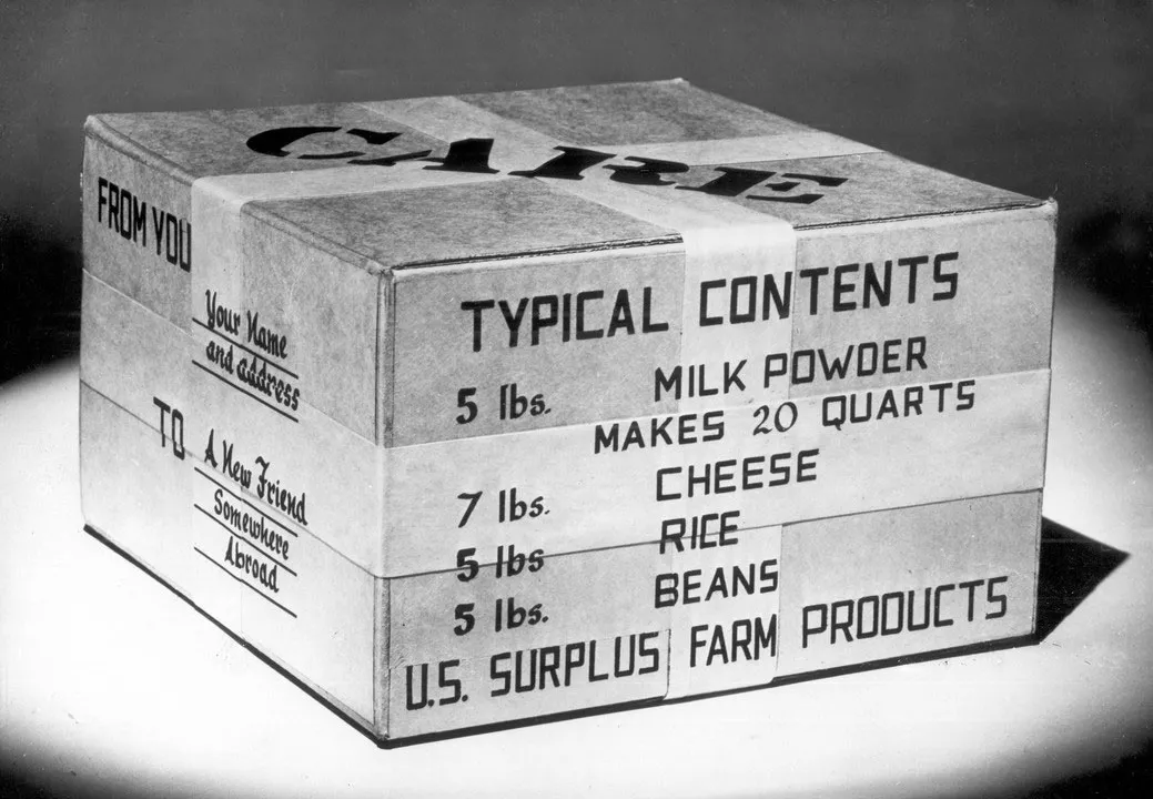 A CARE Package. One the side is printed a list of typical contents, including 